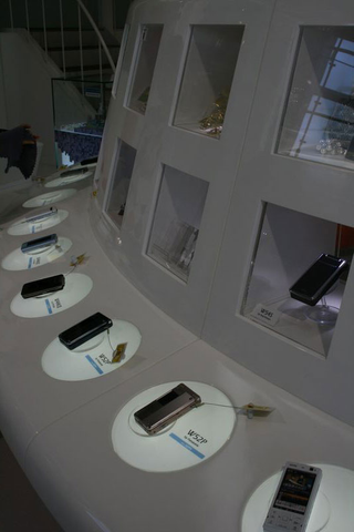 Illustration for article titled The KDDI Design Center's Futuristic Concept Phones and Less Impressive Regular Phones